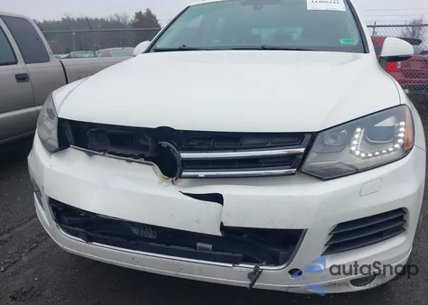 2011 Volkswagen Touareg Tdi Lux z USA, uszkodzony, nr VIN WVGFK9BP7BD007022